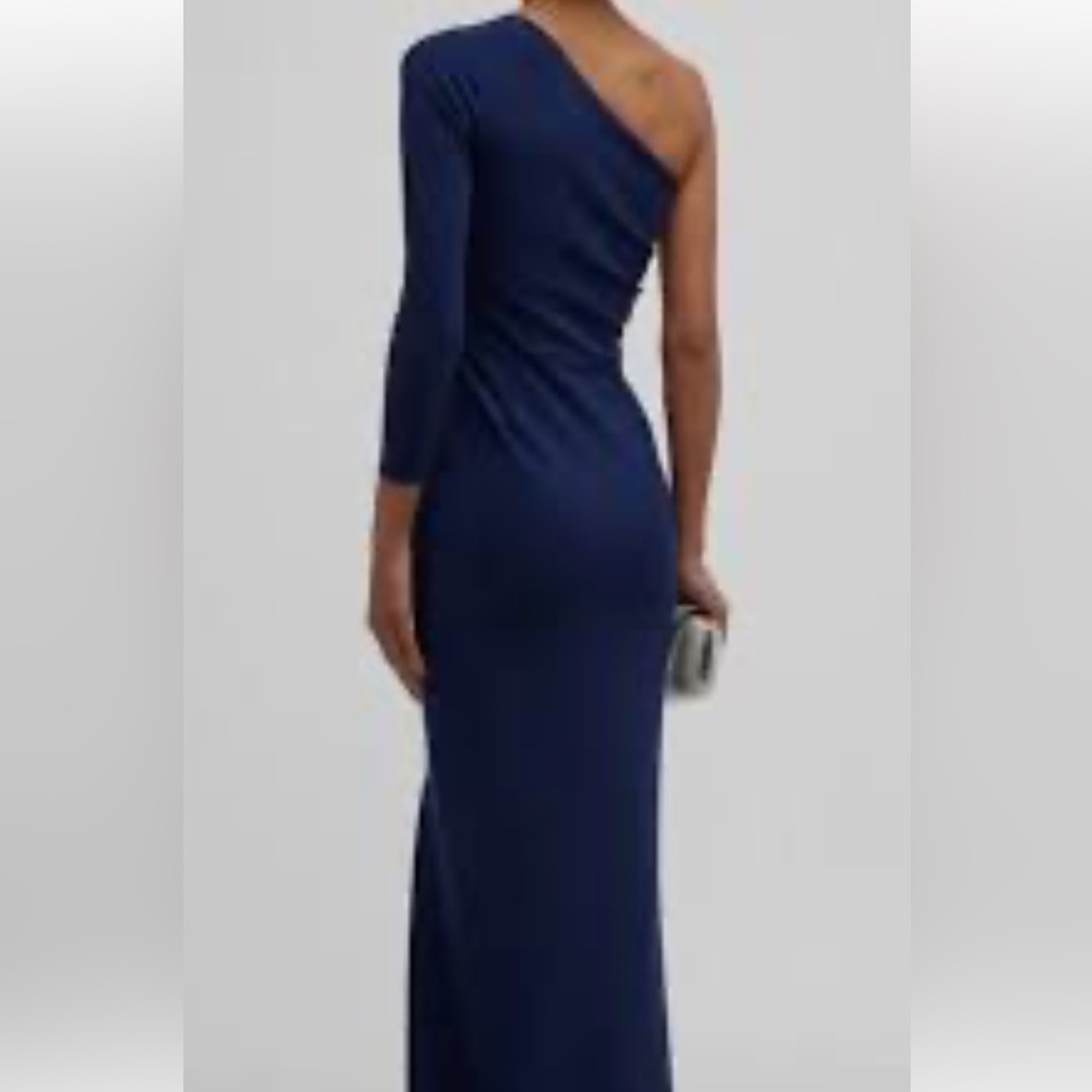 Navy blue, one shoulder, grommet-detail gown.